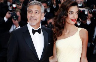 George és Amal Clooney a migráns gyerekeket támogatja