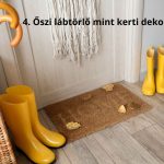 Barna lábtörlő, őszi falevelek, sárga gumicsizmák és esernyők nyele ház bejáratánál