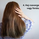 Hosszú, dús, barna hajú nő megérinti az egyik kezével a haját.