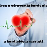 Kardiológus üvegtáblára ír, piros szív és EKG-vonal