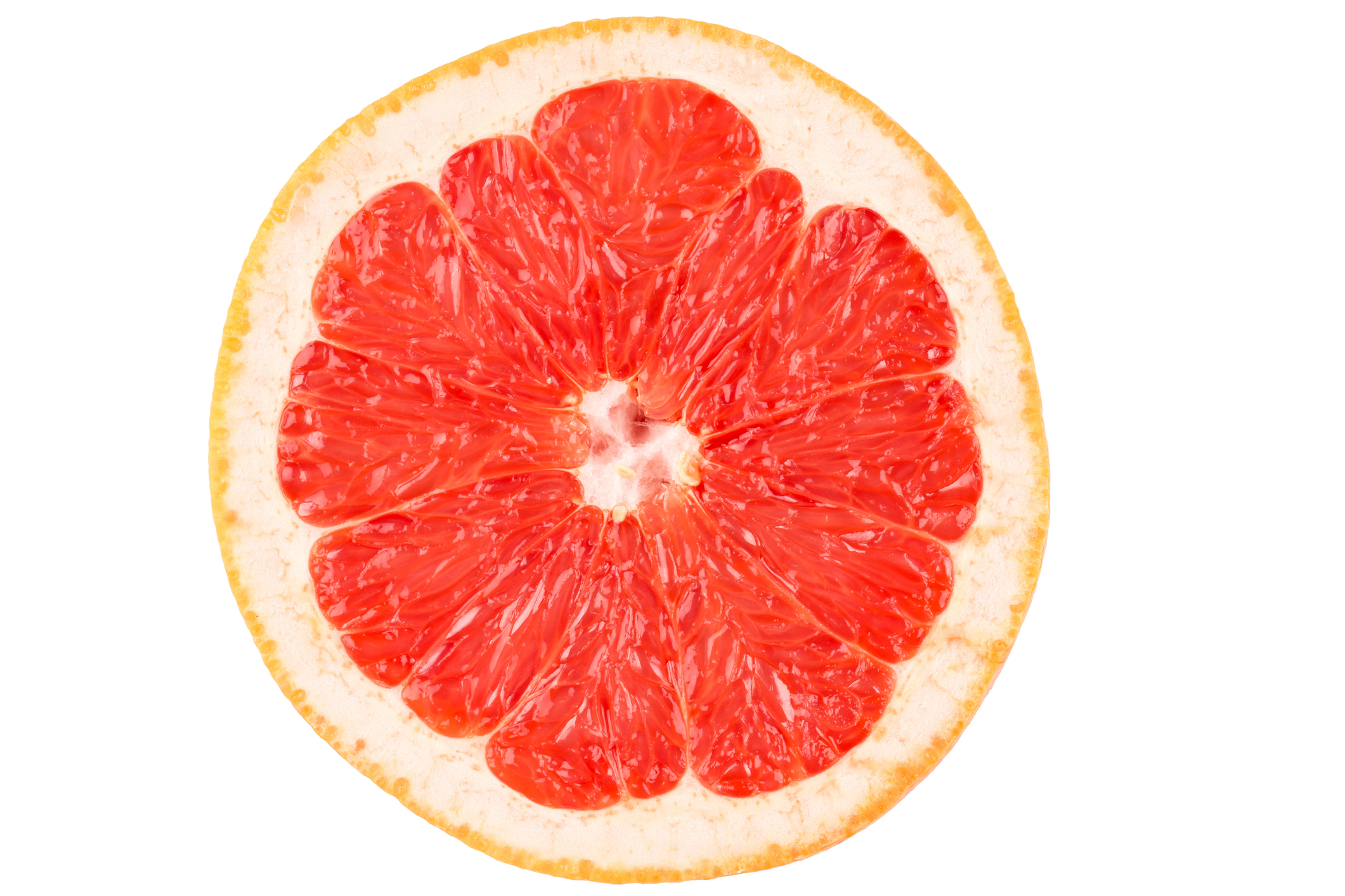 fél grapefruit fehér háttér előtt