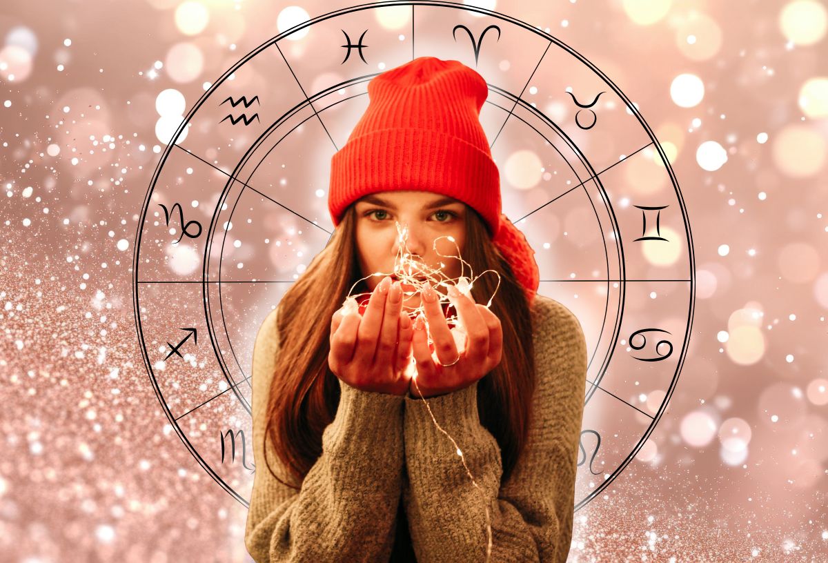 Egy piros sapkás nő barna hajjal, karácsonyi égőket fog, mögötte horoszkóp szimbólum és csillogós háttér