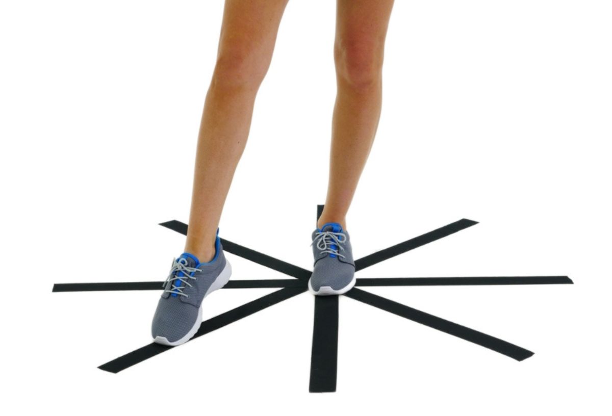 Női láb miközben óramutató gyakorlatot végez