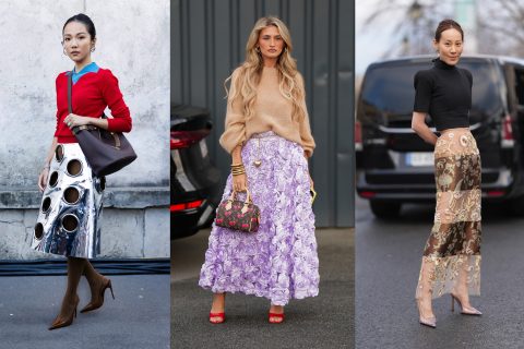 Modellek statement szoknyákban vonulnak az utcán