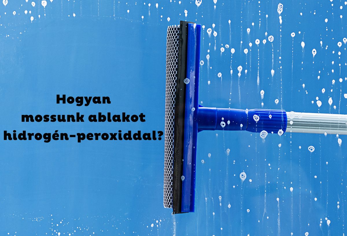 kék háttér, ablakmosó lehúzza az ablaktisztítót ablakfelületről oldalról benyúlva