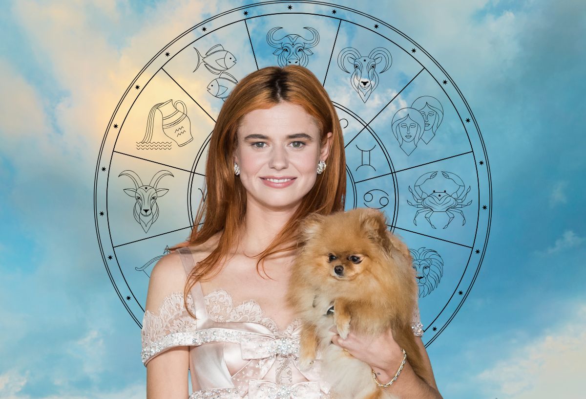 Az Üvöltő szelek színésznője pomerániai törpespiccel kezében kék égbolt előtt, mögötte csillagjegyek szimbólumai körben