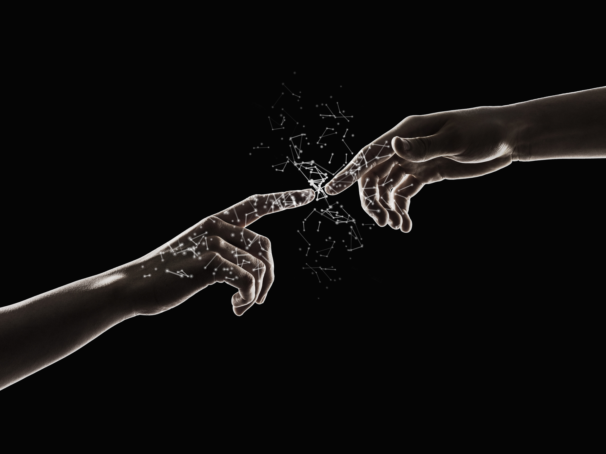 Egy ember és egy robot kéz összeér