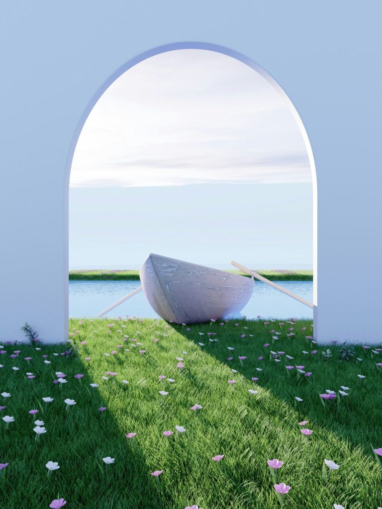heti-horoszkop-kos-szezon-aprilis-13-19 | Marie Claire Fehér boltív alatt fehér csónak tengerre néz, előtérben zöld gyep