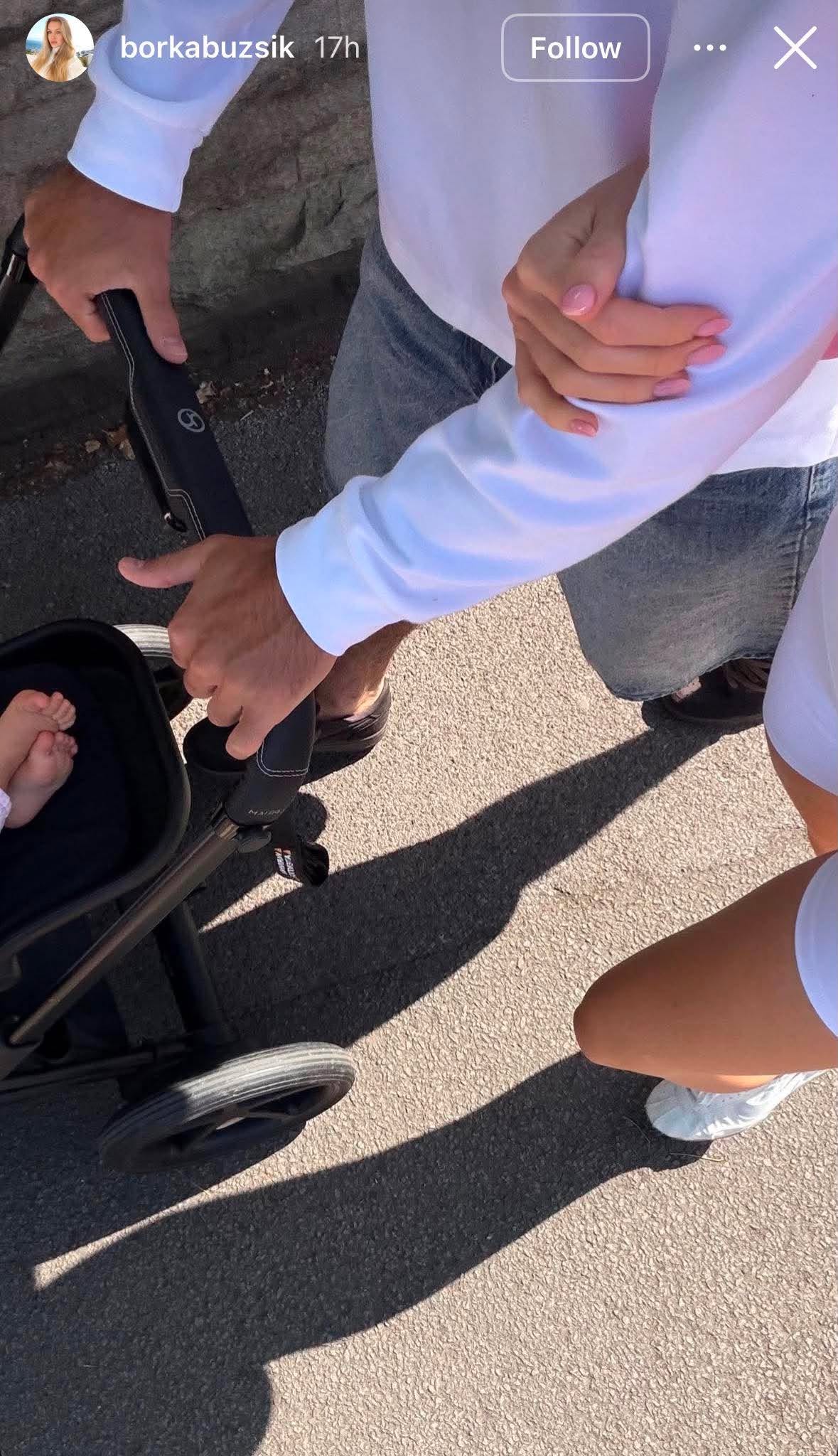 szoboszlai-dominik-felesege-buzsik-borka-edzes-ruha | Marie Claire babakocsit fogó kezek – részlet (Instagram sztori)