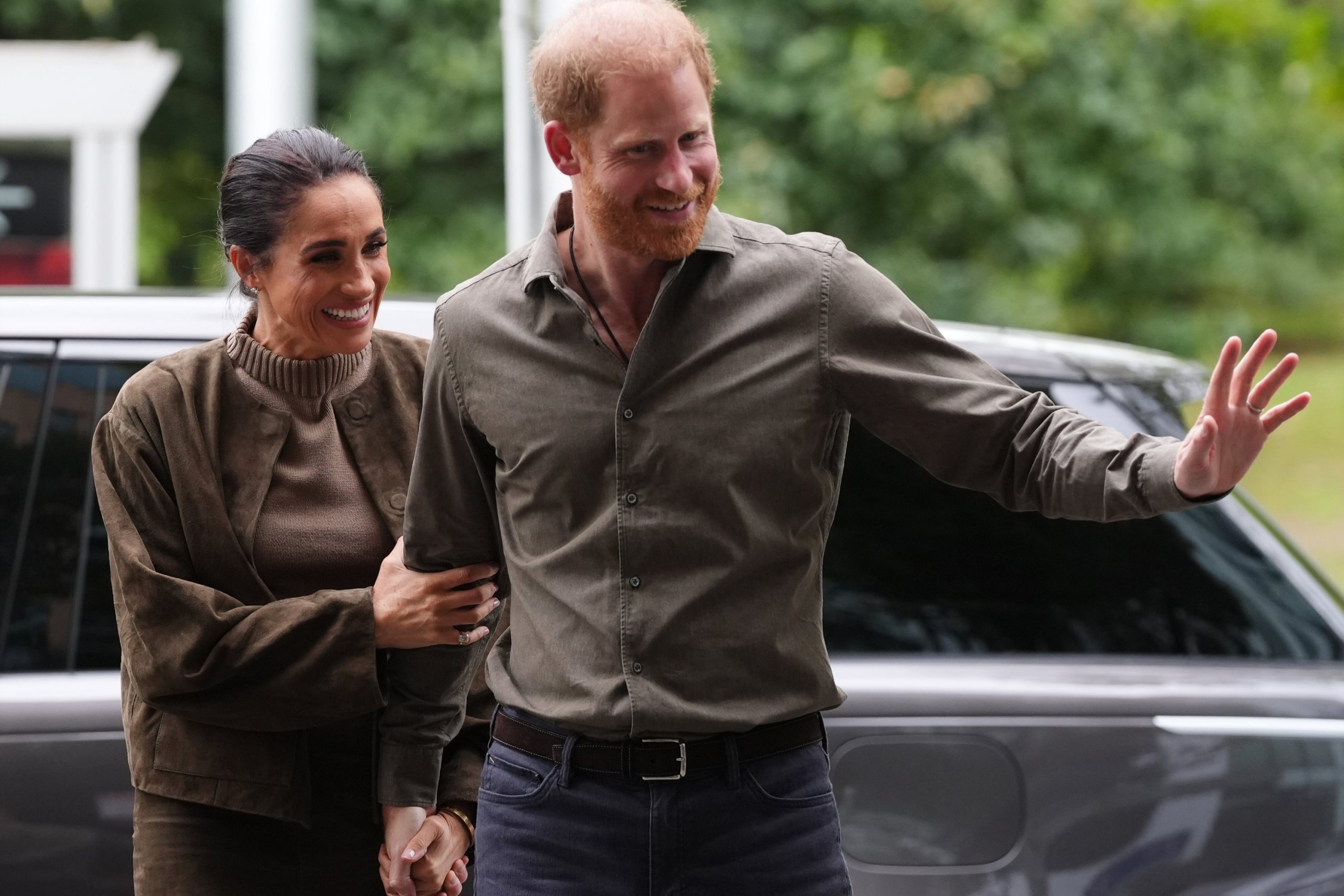Harry herceg és Meghan Markle zöld pulóverben